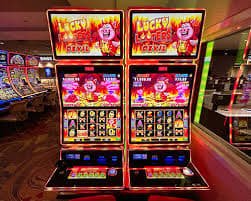 Joker Gaming slot interface showing reel layout, paylines, and bonus trigger on idamantoto login